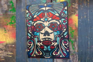 Dia de los Muertos skull laser cut and painted wood