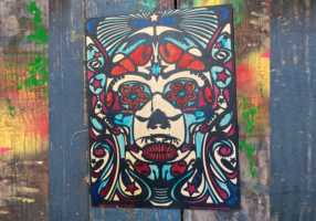 Dia de los Muertos skull laser cut and painted wood